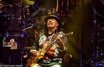 Santana and The Doobie Brothers Deliver a Masterclass in Rock. Santana's founder and namesake, Carlos Santana, performing live at the Hollywood Amphitheater in Maryland Heights, MO.